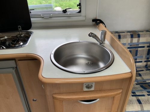 McLouis Lagan 253 G Semi-integrated, Small camper, with bicycle garage, Transverse bed, Year 2006 Camper center On The Road photo: 19