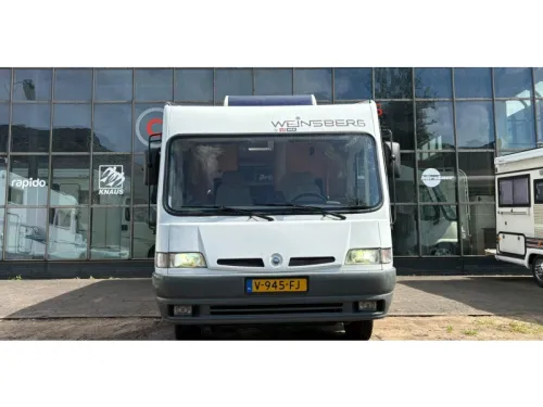 Weinsberg Komet 680 MQ,Fixed bed,Pop-top roof  photo: 1