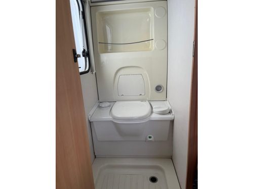 HOME-CAR Racer 45 Spirit | French bed | Dinette | Front bicycle rack | Heater | Refrigerator | Toilet and sink photo: 17