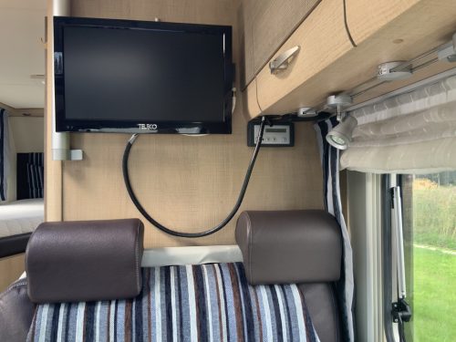 B&uuml;rstner Travel Van 2.3 MultiJ. 130 HP Semi-integrated. Engine air conditioning, Garage, 2 single beds, Length 6.70 m., etc. Year of manufacture 2013 Motorhome center on the road photo: 11