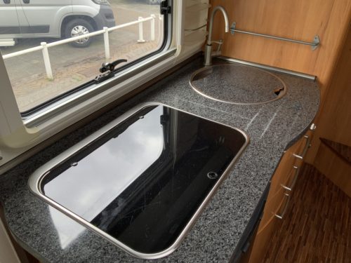 Hymer B 504 SL A-class, Equipped with 1 pers. bed at the rear and a pop-up bed at the front, Engine air conditioning, Alko chassis etc, Year of manufacture 2009 Motorhome centre on the road photo: 12