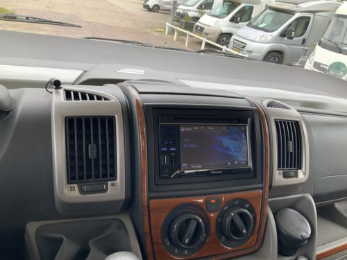 Hymer B 504 SL A-class, Equipped with 1 pers. bed at the rear and a pop-up bed at the front, Engine air conditioning, Alko chassis etc, Year of manufacture 2009 Motorhome centre on the road photo: 22