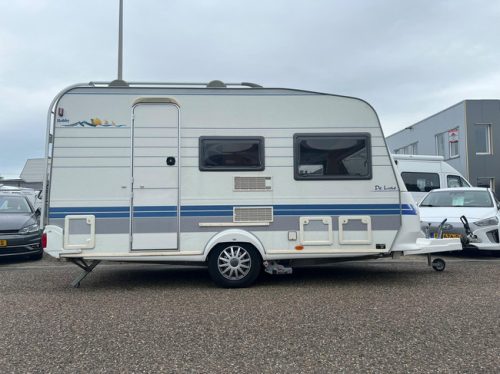 Hobby De Luxe 400 SF | Awning | Bike rack | Mover Semi Automatic | Fixed bed | Dinette (Train seat) | Tempo 100 | Shock absorbers photo: 3