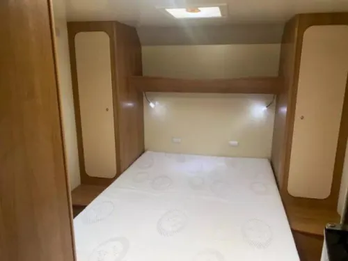 P.L.A. Camper Voyager Queensbed Drop-down bed photo: 3
