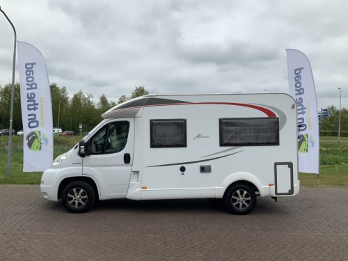 B&uuml;rstner Nexxo 569 Semi-integrated, Train seat, French bed, two swivel chairs, small camper, Year 2010 Camper centrum on the road photo: 1
