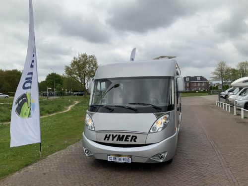 Hymer B 504 SL A-class, Equipped with 1 pers. bed at the rear and a pop-up bed at the front, Engine air conditioning, Alko chassis etc, Year of manufacture 2009 Motorhome centre on the road photo: 1