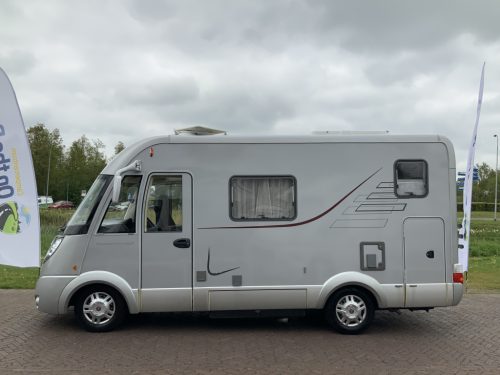 Hymer B 504 SL A-class, Equipped with 1 pers. bed at the rear and a pop-up bed at the front, Engine air conditioning, Alko chassis etc, Year of manufacture 2009 Motorhome centre on the road photo: 3