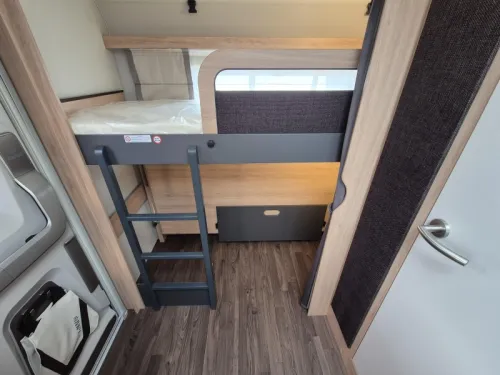 Knaus Sport Platinum 500 QDK Bunk bed and garage door photo: 19