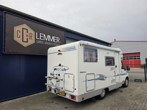 Adria Coral Compact 574 SP Festbett, 6M, Garage Foto: 1