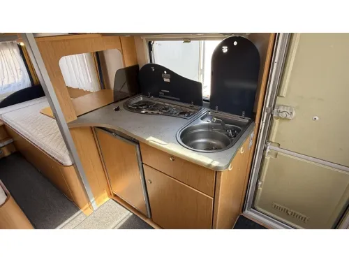 Knaus Sudwind 500 EU enkele bedden rondzit  foto: 8
