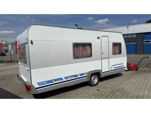 Dethleffs Camper 490 TK 2x Sitzgruppe Etagenbett Foto: 9
