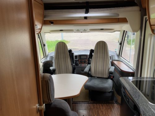 Hymer B 504 SL A-class, Equipped with 1 pers. bed at the rear and a pop-up bed at the front, Engine air conditioning, Alko chassis etc, Year of manufacture 2009 Motorhome centre on the road photo: 11