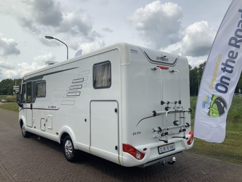 Hymer Exsis-I 674 EX 2.3 MultiJet 160 HP, A-class, Motor air conditioning, 2 Single beds, Pop-top roof bed, Garage, Towing hitch, etc, etc. Camper centrum on the road photo: 44
