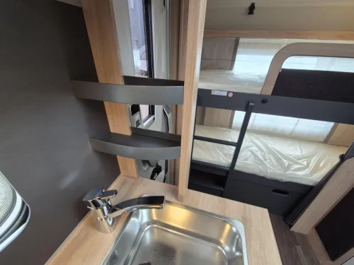 Knaus Sport Platinum 500 QDK Bunk bed and garage door photo: 11