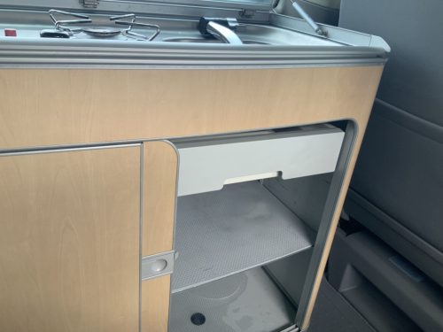 VW Westfalia California 2.5 TDi 130 HP, 5 Seats, 4 Berths, Elektr. pop-top roof / side door, Year of manufacture 2006 Motorhome Centre On the Road at the Noorderringweg 4 in Marum. photo: 13
