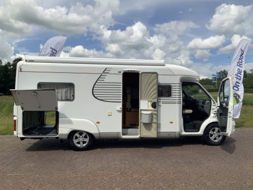 LMC Fiat Ducato 2.8 JTD 128 HP, AUTOMATIC Semi-integrated, Engine air conditioning, 2 Single beds (Low), Alko-chassis etc. Year of manufacture 2003 Motorhome centre on the road Marum photo: 2
