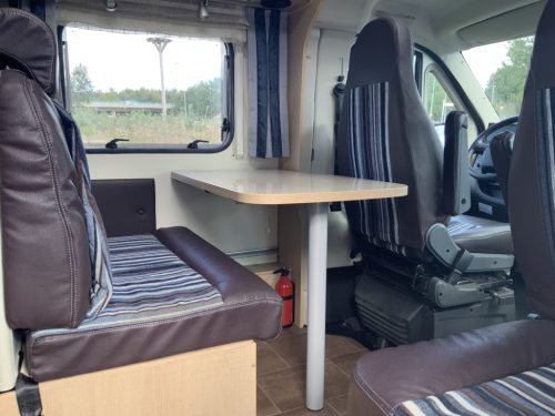 B&uuml;rstner Travel Van 2.3 MultiJ. 130 HP Semi-integrated. Engine air conditioning, Garage, 2 single beds, Length 6.70 m., etc. Year of manufacture 2013 Motorhome center on the road photo: 12