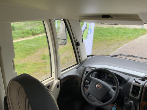 Hymer B 504 SL A-class, Equipped with 1 pers. bed at the rear and a pop-up bed at the front, Engine air conditioning, Alko chassis etc, Year of manufacture 2009 Motorhome centre on the road photo: 24
