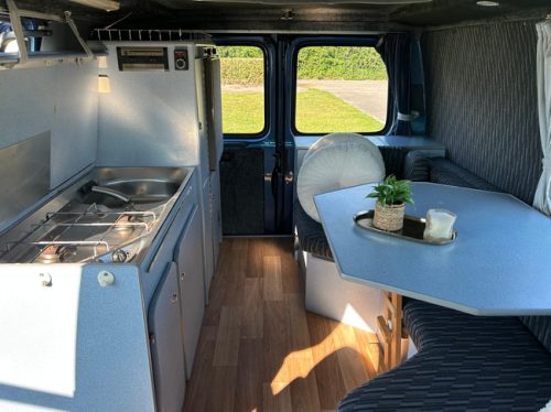 Ford TRANSIT 80D ORIGINAL FACTORY CAMPER VAN 4 SLEEPING PLACES | Towbar | Awning | Inverter photo: 3