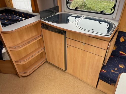 HOME-CAR Racer 45 Spirit | French bed | Dinette | Front bicycle rack | Heater | Refrigerator | Toilet and sink photo: 12