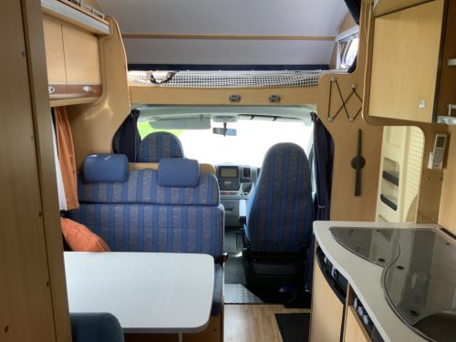 Detlheffs A 5881 Fiat 2.3 130 HP, Alcove, Bunk bed, 5 seats and 6 berths, Shows signs of use, Year 2007 Camper centrum on the road photo: 6