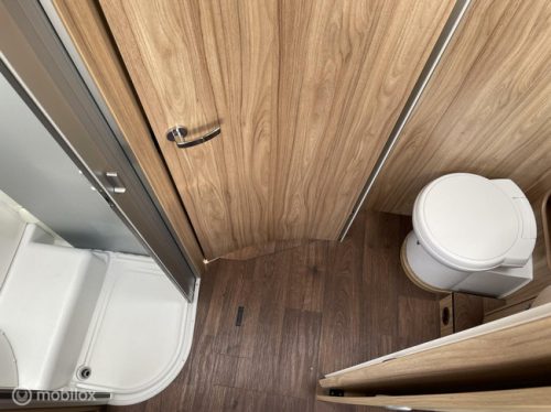 Hymer Tramp 698 Semi-integrated with Pop-top roof AND Queen bed 2X Air conditioning, Solar very few km's! photo: 14