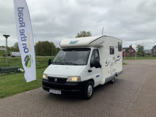 McLouis Lagan 253 G Semi-integrated, Small camper, with bicycle garage, Transverse bed, Year 2006 Camper center On The Road