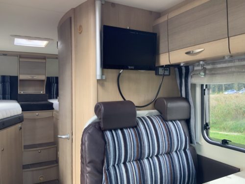 B&uuml;rstner Travel Van 2.3 MultiJ. 130 HP Semi-integrated. Engine air conditioning, Garage, 2 single beds, Length 6.70 m., etc. Year of manufacture 2013 Motorhome center on the road photo: 6