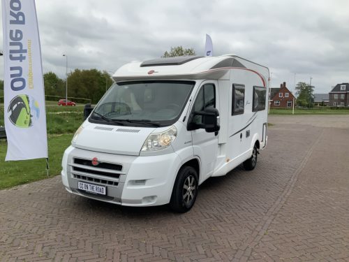 B&uuml;rstner Nexxo 569 Semi-integrated, Dinette, French bed, two swivel chairs, small camper, Year 2010 Camper centrum on the road