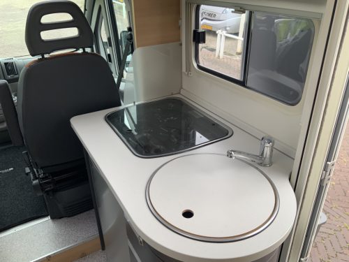 Knaus Van Ti 600 ME &ndash; Complete 3 liter 160 HP Semi-integrated, fixed bed, half-dinette, swivel seats Motorhome centre on the road photo: 14