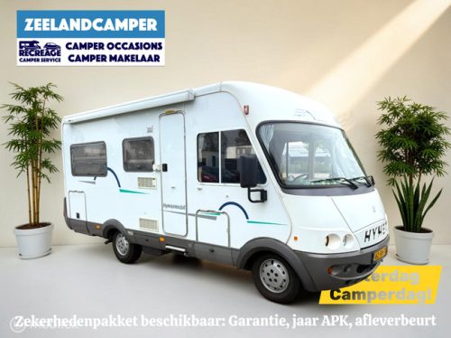 Hymer B574 &ndash; Ger&auml;umiger Vollintegriert-Wohnmobil mit Festbett UND ger&auml;umigem Hubbett Foto: 1