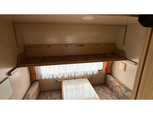 Adria Optima 425 TK fixed bed seating toilet room photo: 3