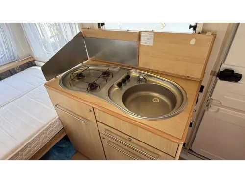 Chateau Calista 390 TDZ coin repas lit fixe toilette photo : 7