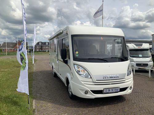 Hymer Exsis-I 674 EX 2.3 MultiJet 160 HP, A-class, Motor-airco, 2 Single beds, Pop-top roof bed, Garage, Towing hitch, etc, etc. Camper centrum on the road photo: 2