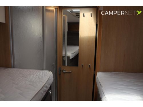 LMC Tourer Lift 730 165HP | Single beds | Separate shower | Pop-top roof | Bike rack | Solar panel | Bearlock | Roof air conditioning | Awning | photo: 19