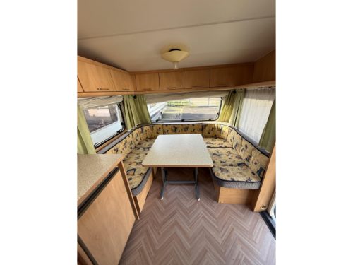 B&uuml;rstner Ventana 500 TS French bed U-shaped dinette Awning photo: 16