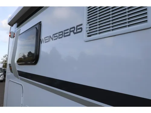 Weinsberg CaraSuite 650 MEG Camas individuales y cama elevable foto: 3