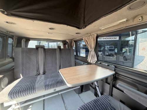 Ford TRANSIT-EUROLINE/NUGGET van conversion 7 seats in very neat condition air conditioning sofa bed pop-top roof towbar apk until 30-04-27 photo: 13