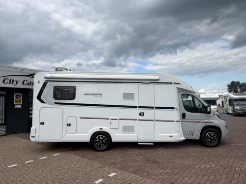 Weinsberg CaraSuite Edition IC-line 700 MEG 140 PS Euro 6 L&auml;ngsbetten+Hubbett elktr Sch&uuml;ssel TV Garage Fahrradtr&auml;ger Markise Fliegengitter T&uuml;r Kamera Foto: 2
