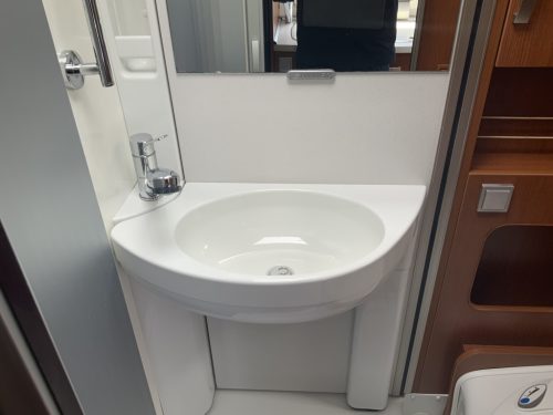 Hymer Exsis-I 674 EX 2.3 MultiJet 160 HP, A-class, Motor air conditioning, 2 Single beds, Pop-top roof bed, Garage, Towing hitch, etc, etc. Camper centrum on the road photo: 35