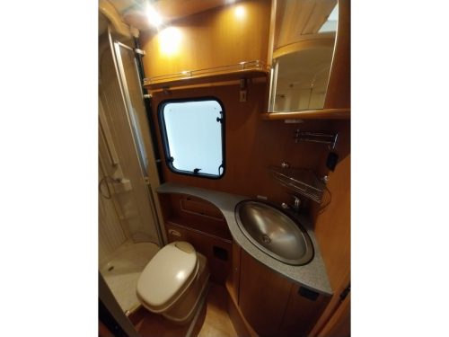 Dethleffs Globetrotter 6844 RT with a beautiful French bed photo: 10