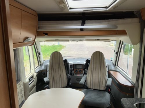 Hymer B 504 SL A-class, Equipped with 1 pers. bed at the rear and a pop-up bed at the front, Engine air conditioning, Alko chassis etc, Year of manufacture 2009 Motorhome centre on the road photo: 9