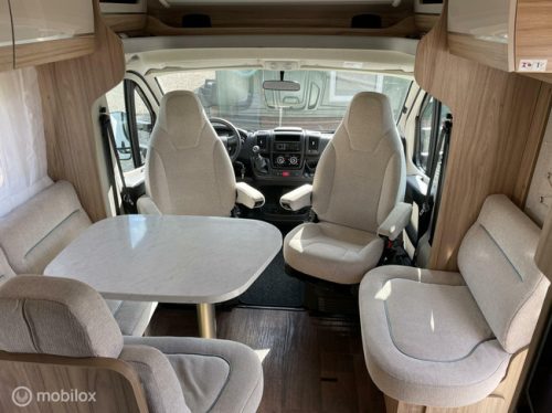 Hymer Tramp 698 Semi-integrated with Pop-top roof AND Queen bed 2X Airco, Solar very few km's! photo: 1