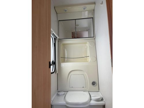 HOME-CAR Racer 45 Spirit | French bed | Dinette | Front bicycle rack | Heater | Refrigerator | Toilet and sink photo: 18