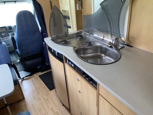 Detlheffs A 5881 Fiat 2.3 130 HP, Alcove, Bunk bed, 5 seats and 6 berths, Shows signs of use, Year 2007 Camper centrum on the road photo: 12