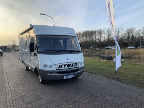 Hymer B 614 2.8 JTD 146 HP Integral, Transverse &ndash; bed & Pull-down bed, Garage etc., Year 2005 Camper centrum on the road photo: 2