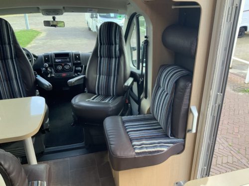 B&uuml;rstner Travel Van 2.3 MultiJ. 130 HP Semi-integrated. Engine air conditioning, Garage, 2 single beds, Length 6.70 m., etc. Year of manufacture 2013 Motorhome center on the road photo: 7