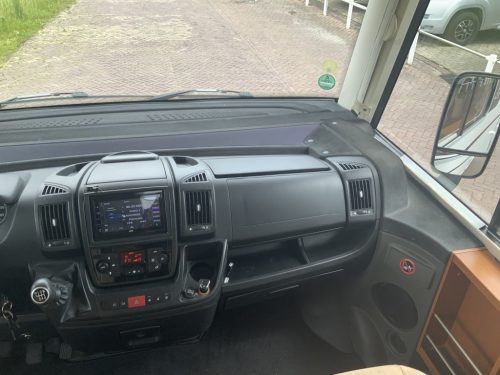 Hymer Exsis-I 674 EX 2.3 MultiJet 160 HP, A-class, Motor air conditioning, 2 Single beds, Pop-top roof bed, Garage, Towing hitch, etc, etc. Camper centrum on the road photo: 25