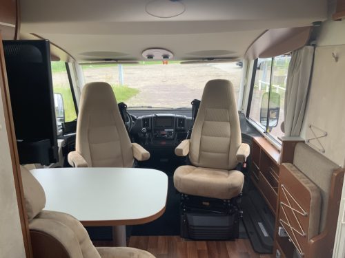 Hymer Exsis-I 674 EX 2.3 MultiJet 160 HP, A-class, Motor-airco, 2 Single beds, Pop-top roof bed, Garage, Towing hitch, etc, etc. Camper centrum on the road photo: 7