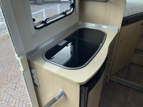 B&uuml;rstner Travel Van 2.3 MultiJ. 130 HP Semi-integrated. Engine air conditioning, Garage, 2 single beds, Length 6.70 m., etc. Year of manufacture 2013 Motorhome center on the road photo: 15